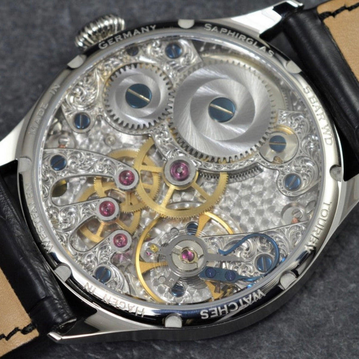 Skeletonization, rhodium(silver) plating of customer's watch mechanism, barrel and crown wheels customisation